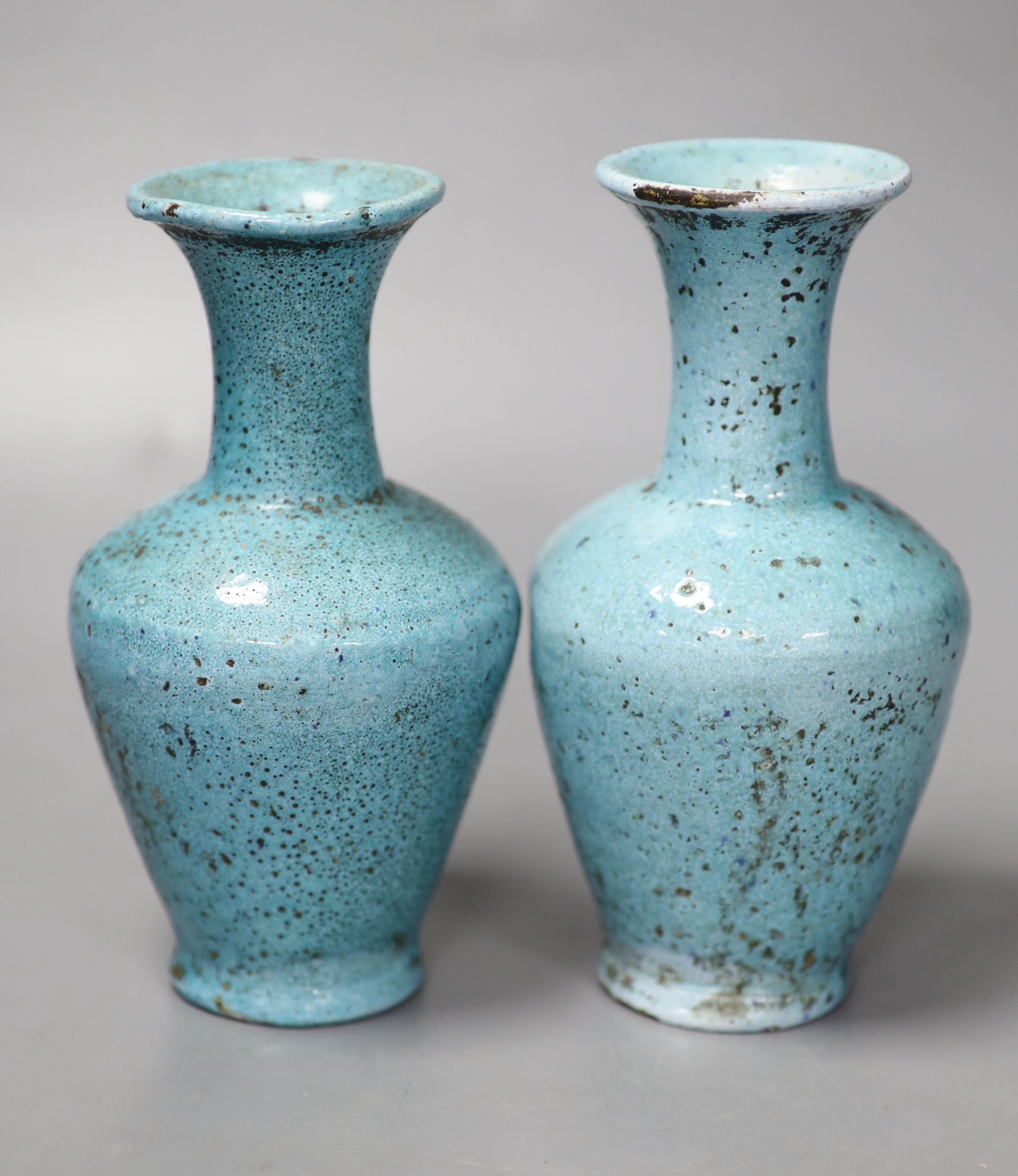 A pair of pale blue Eastern pottery vases, 16.5cm high